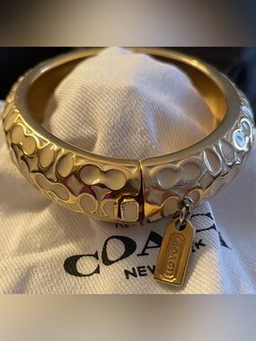 Coach Gold-Tone Embossed C Logo Hinged Bangle with Tag